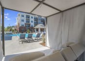 Thumbnail 43 of 78 - Lounge Swimming Pool With Cabana at Pointe at Prosperity Village Apartment Rentals in Charlotte, North Carolina