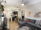 Thumbnail 53 of 78 - Living Room Come Kitchen View at Pointe at Prosperity Village Apartment Rentals for Rent in North Carolina