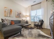 Thumbnail 55 of 78 - Modern Living Room at Pointe at Prosperity Village Rentals in North Carolina