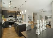 Thumbnail 13 of 78 - Well Equipped Pointe at Prosperity Village Kitchen And Dining at Pointe in Charlotte, North Carolina Apartments for Rent