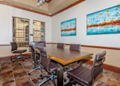 Thumbnail 14 of 30 - Business center with a wall with paintings on it