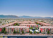 Thumbnail 30 of 30 - an aerial view of a city with a lot of houses