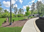 Thumbnail 10 of 37 - take a stroll through our trails at villas at houston levee west apartments in cord
