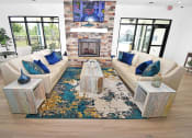Thumbnail 13 of 37 - a living room filled with furniture and a fireplace