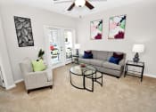 Thumbnail 2 of 37 - a living room with two couches and a coffee table