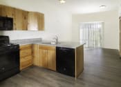 Thumbnail 5 of 10 - a kitchen and living room in a 555 waverly unit