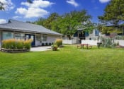 Thumbnail 5 of 32 - a backyard with a picnic table and a house