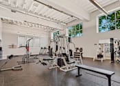 Thumbnail 14 of 31 - the gym has plenty of exercise equipment and windows