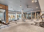 Thumbnail 4 of 19 - 24-hour fitness center at The Mill Old Town in Lewisville TX”
