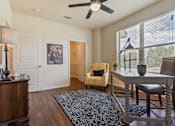 Thumbnail 8 of 16 - Stylish living area with modern décor at Auberge of Tyler apartments in Tyler TX.