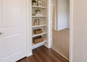 Thumbnail 17 of 24 - Built-in shelving and storage area in a three-bedroom apartment home at Auberge of Tyler.