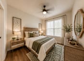 Thumbnail 10 of 24 - Secondary bedroom in a two-bedroom apartment home at Auberge of Tyler with natural light and modern finishes.