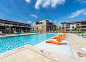 Thumbnail 4 of 35 - our apartments offer a swimming pool  at One Preston Station, Celina, Texas