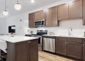 Thumbnail 6 of 17 - Luxury Open Concept Kitchen at Panton Mill Station Apartments,J Street Property Services, LLC, South Elgin, 60177