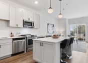 Thumbnail 7 of 17 - Chef Inspired Kitchen  with appliances at Panton Mill Station Apartments,J Street Property Services, LLC, South Elgin, Illinois