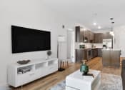 Thumbnail 8 of 17 - Sophisticated Living room with tv and sofas at Panton Mill Station Apartments,J Street Property Services, LLC, South Elgin, 60177