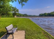 Thumbnail 14 of 17 - Riverside park with benches at Panton Mill Station Apartments,J Street Property Services, LLC, South Elgin, IL