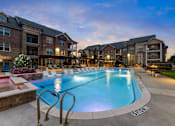 Thumbnail 4 of 19 - A large swimming pool in front of a building with the name "BROOK" written on the ground.