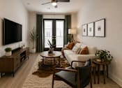 Thumbnail 21 of 23 - Spacious living room with abundant natural light, modern finishes, and open-concept design at The Mill Old Town Apartments.
