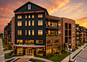Thumbnail 1 of 23 - A modern building with the words