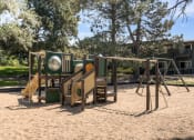 Thumbnail 5 of 21 - Playground at Greentree Village Apartments