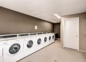 Thumbnail 21 of 21 - The Laundry Facilities at Greentree Village Apartments