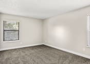 Thumbnail 15 of 29 - Carpeted Bedroom at Hilltop View Apartments