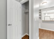 Thumbnail 11 of 38 - A Coat Closet off of the Living Room at The Buttes Apartments, Colorado