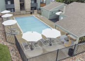Thumbnail 25 of 29 - Aerial view of our community pool at Hilltop View Apartments