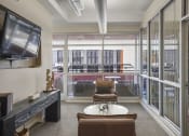 Thumbnail 7 of 21 - Our Apartment Building Interior Lobby overlooking the Common Area Patio at Sleek Lofts