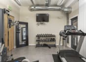 Thumbnail 10 of 21 - Our Apartment Fitness Center at Sleek Lofts Apartments
