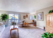 Thumbnail 6 of 21 - A Standard Living Room at Greentree Village Apartments