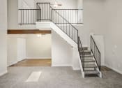 Thumbnail 6 of 29 - A living room with loft at Hilltop View Apartments