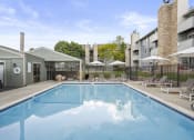 Thumbnail 22 of 29 - Outdoor Pool at Hilltop View Apartments