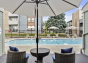 Thumbnail 23 of 29 - Pool and Lounge Area at Hilltop View Apartments