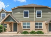Thumbnail 1 of 17 - Front exterior of Alder Square Townhomes Apartments, Loveland, CO