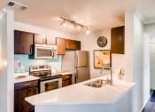 Thumbnail 4 of 29 - Kitchen view at Eagles Landing Apartments