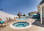 Thumbnail 21 of 29 - Our Outdoor Heated Pool and Hot Tub/Spa at Eagles Landing Apartments