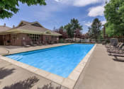 Thumbnail 28 of 38 - The Outdoor Swimming Pool at The Buttes Apartments, Colorado