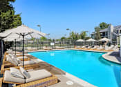 Thumbnail 21 of 27 - The Pool With Cabana at Horizon East Apartments.