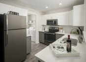 Thumbnail 19 of 42 - Modern kitchen at Trevi Apartment Homes, Chandler, AZ
