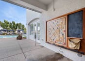 Thumbnail 14 of 28 - Enjoy poolside fun with our game area! Dive in, relax, and play