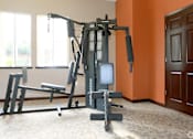 Thumbnail 8 of 28 - Stay active without leaving home! The Crooked Oak gym, located in our clubhouse, is fully equipped and ready for residents to crush their fitness goals anytime.