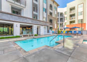 Thumbnail 1 of 46 - the swimming pool at the preserve at polk city apartments at Metro Gateway, Riverside, 92503