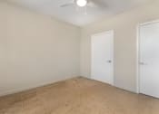 Thumbnail 30 of 46 - an empty room with white walls and a ceiling fan at Metro Gateway, Riverside