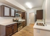 Thumbnail 15 of 30 - Freshly updated kitchen with stainless steel appliances