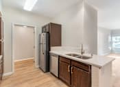 Thumbnail 16 of 30 - Freshly updated kitchen with stainless steel appliances