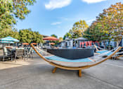 Thumbnail 9 of 30 - Take relaxation to the next level at our pool deck