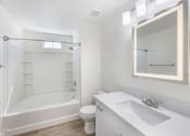 Thumbnail 26 of 45 - The bathrooms have been transformed into serene retreats, featuring spa-like tubs that provide a relaxing escape.