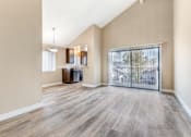 Thumbnail 13 of 28 - Step into serenity: Embrace the spacious living and dining areas, seamlessly connected to a private balcony at Independence Plaza. Your new home awaits, where relaxation meets modern luxury.